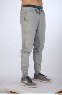 Turgen casual dressed grey sneakers grey trousers leg lower body…